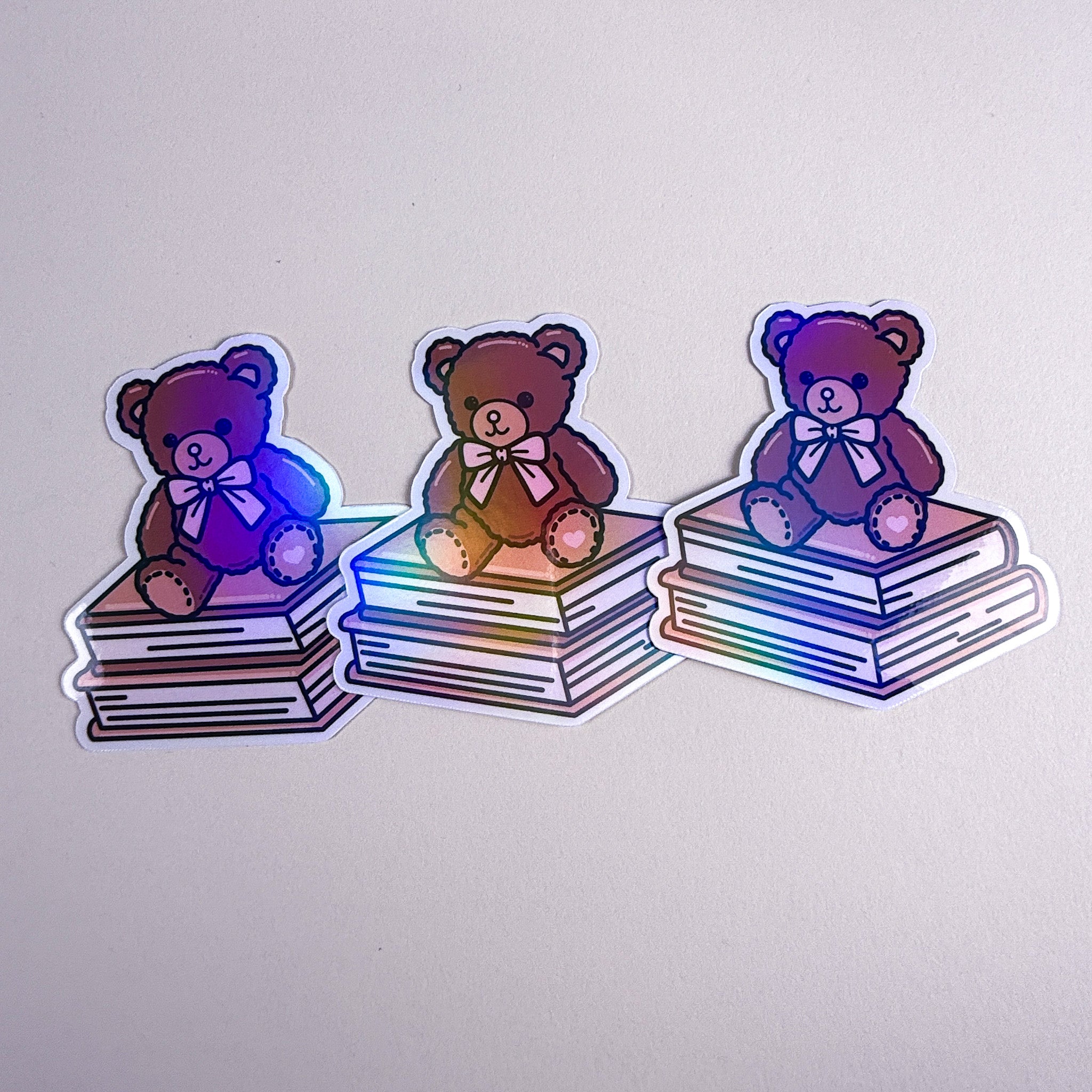 Teddy on Books Vinyl Sticker | 3 inch | Cozy Reader Sticker | Soft Rainbow Holographic