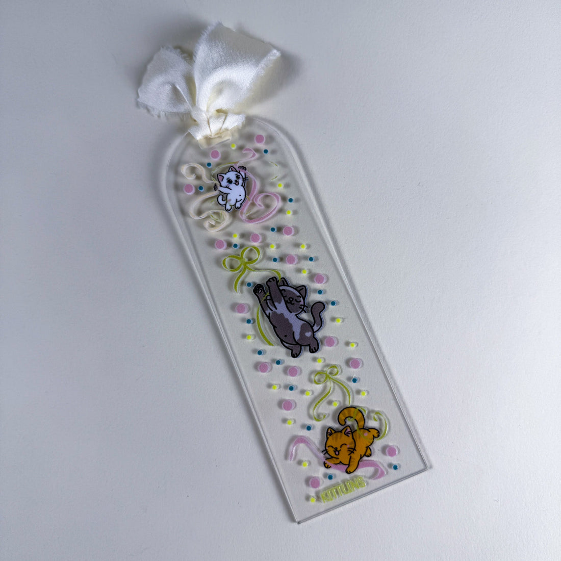 Ribbons Play Kittlins Acrylic Bookmark | 2"w x 6"h Clear Acrylic Bookmark | The Ribbons Collection by Kittins